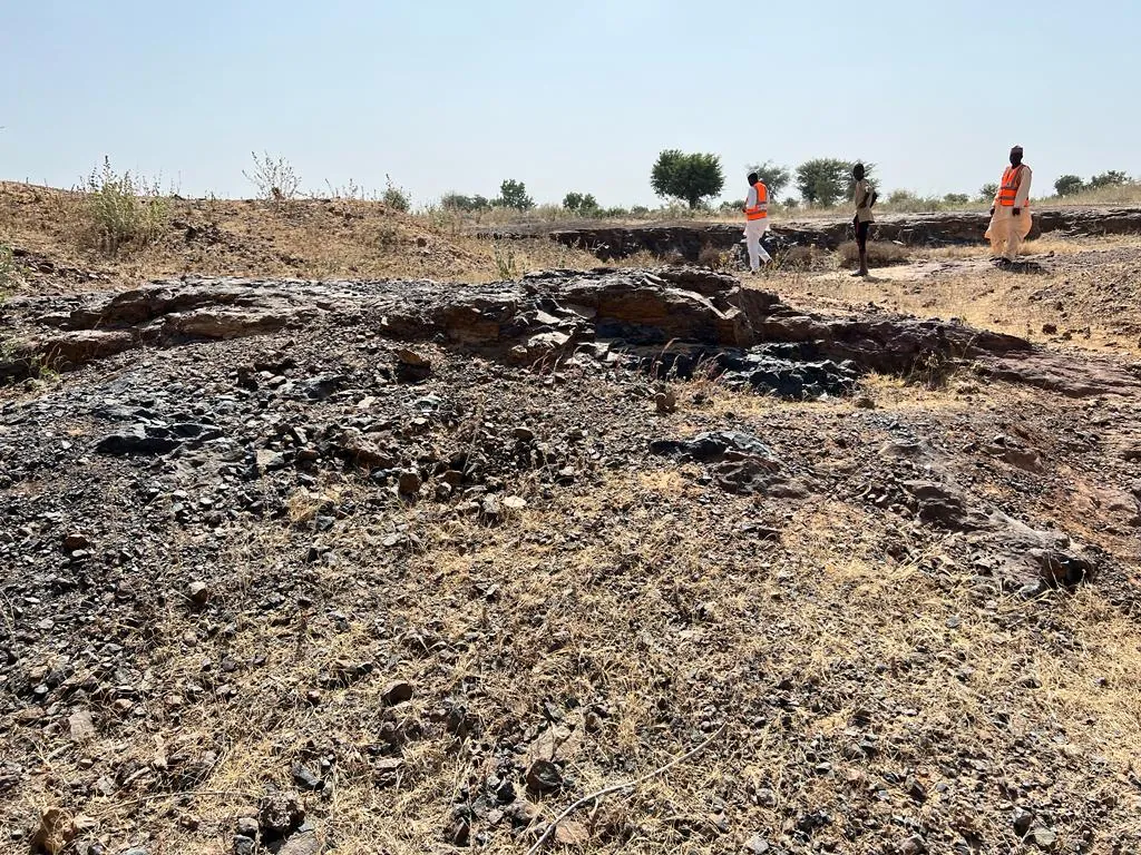 AMEA survey team crossing a licence area